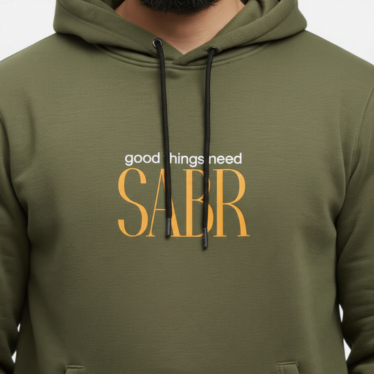 Sunnah Conscious olive green cotton hoodie featuring the text Good Things need SABR in white and yellow print