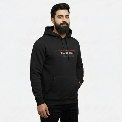 Sunnah Conscious black cotton kangaroo hoodie with A Friend is a Second Self graphic print worn by a bearded man