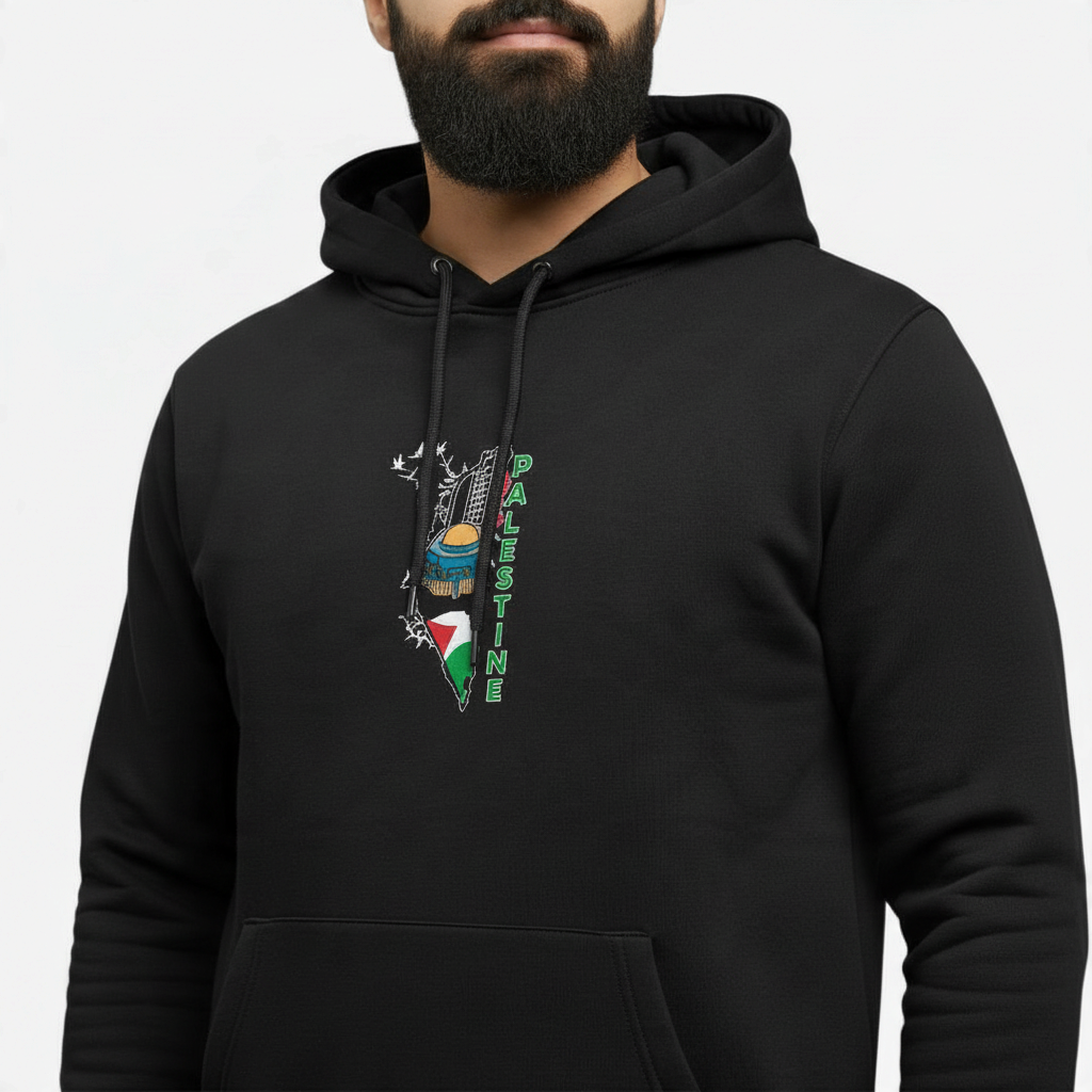 Sunnah Conscious black kangaroo hoodie featuring a Palestine map graphic with a dome and flag design on the chest.