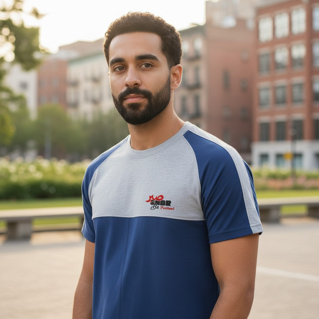 Sunnah Conscious men's blue and heather grey cotton raglan t-shirt with embroidered logo on chest.