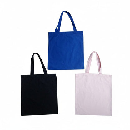 Sunnah Conscious reusable canvas tote bags in blue, black, and light pink with durable reinforced handles.
