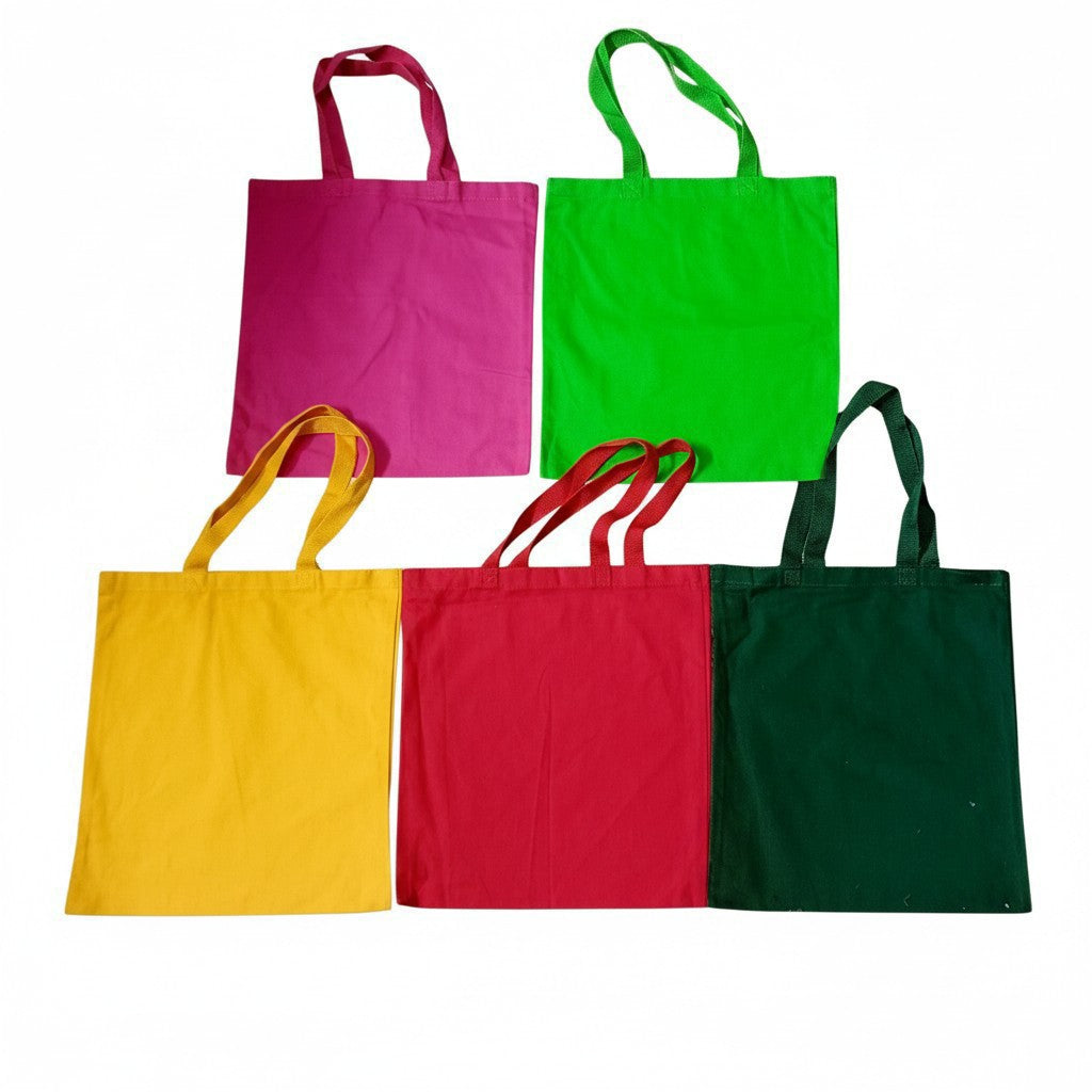 Sunnah Conscious set of five reusable canvas tote bags in vibrant pink, green, yellow, red, and dark green colors.