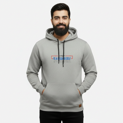 Sunnah Conscious grey cotton hoodie with A Friend is a Second Self graphic print worn by a bearded man