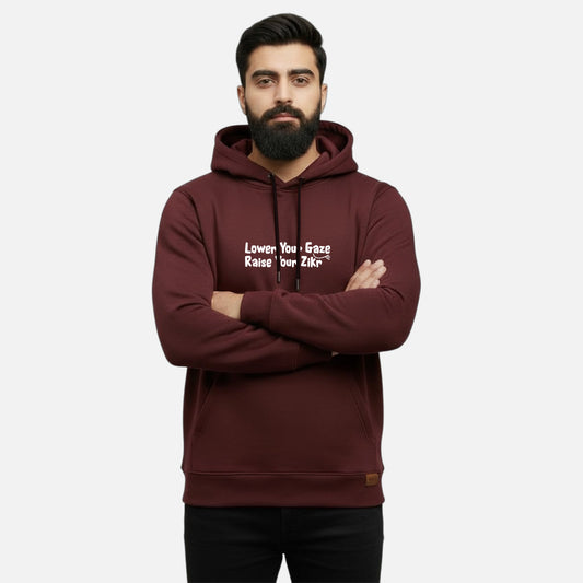 Sunnah Conscious maroon cotton hoodie with Lower Your Gaze, Raise Your Zikr text worn by a bearded man
