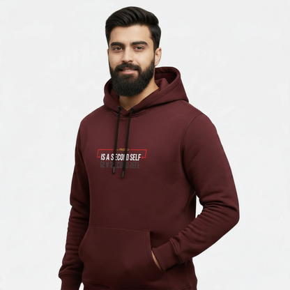 Sunnah Conscious maroon cotton hoodie with A Friend is a Second Self graphic print worn by a bearded man