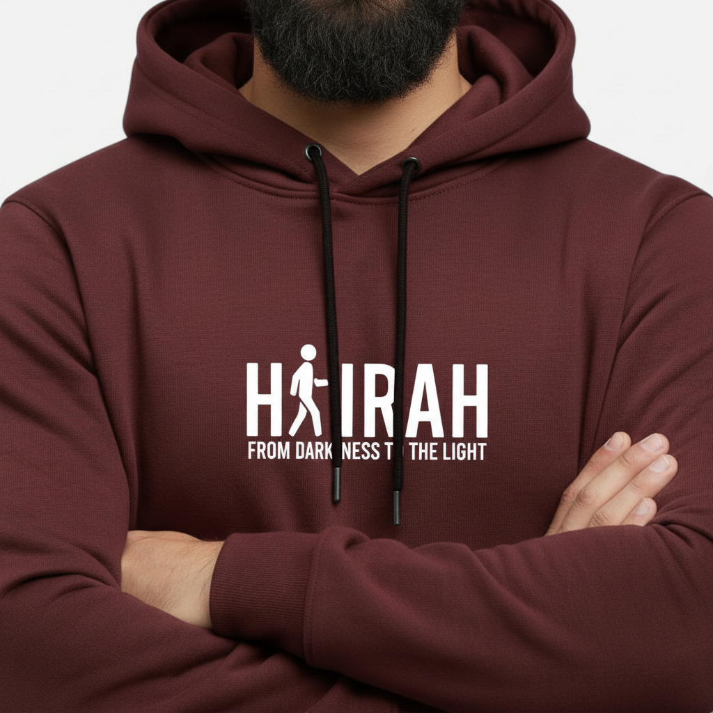 Sunnah Conscious maroon kangaroo hoodie featuring Hijrah From Darkness To The Light graphic print on chest
