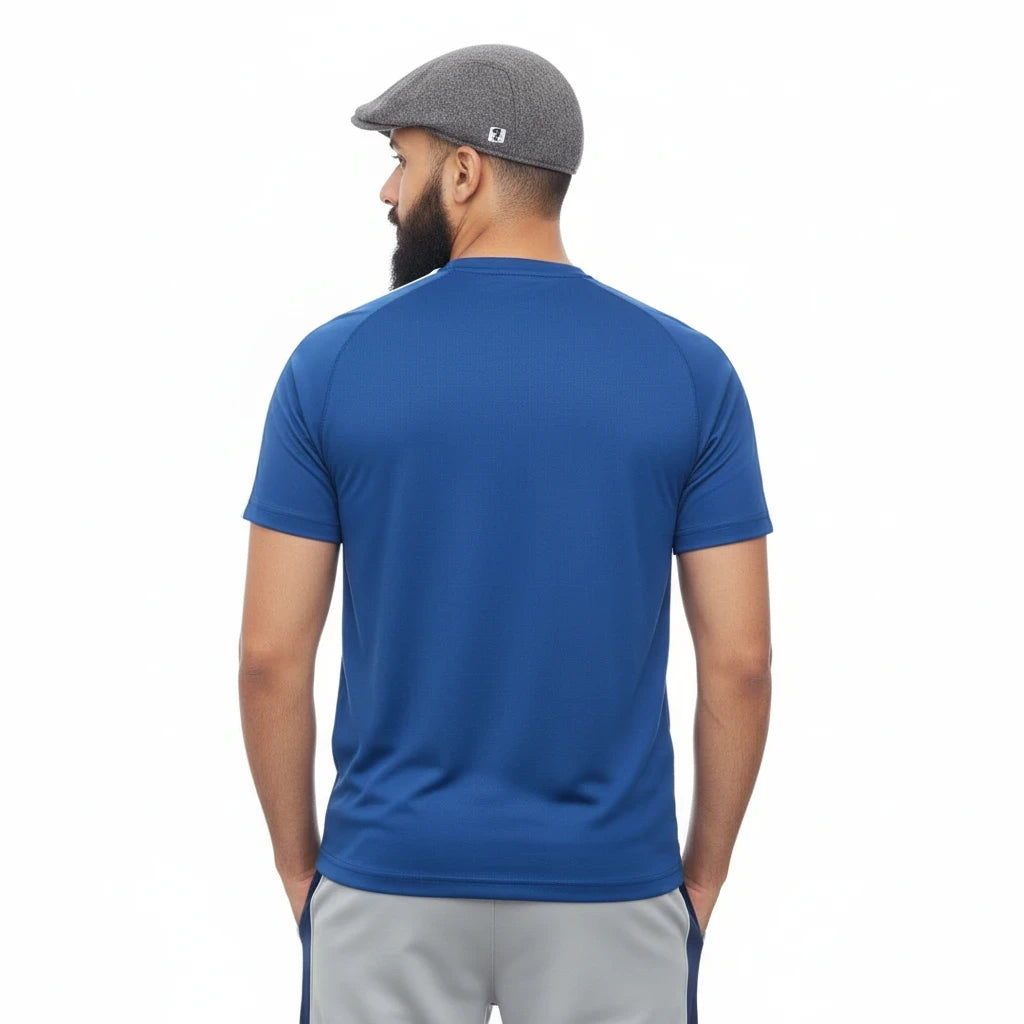 Sunnah Conscious navy blue cotton t-shirt and steel grey shorts worn by a man with a beard and grey flat cap