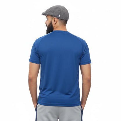 Sunnah Conscious navy blue cotton t-shirt and steel grey shorts worn by a man with a beard and grey flat cap