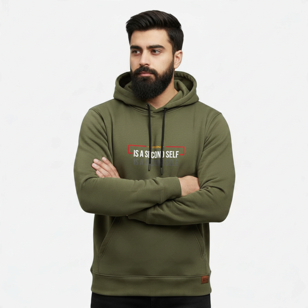 Sunnah Conscious olive green cotton hoodie with A Friend is a Second Self graphic print worn by a bearded man