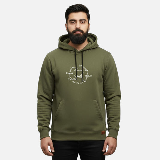 Sunnah Conscious olive green cotton hoodie with white Success Circle graphic print worn by a bearded man