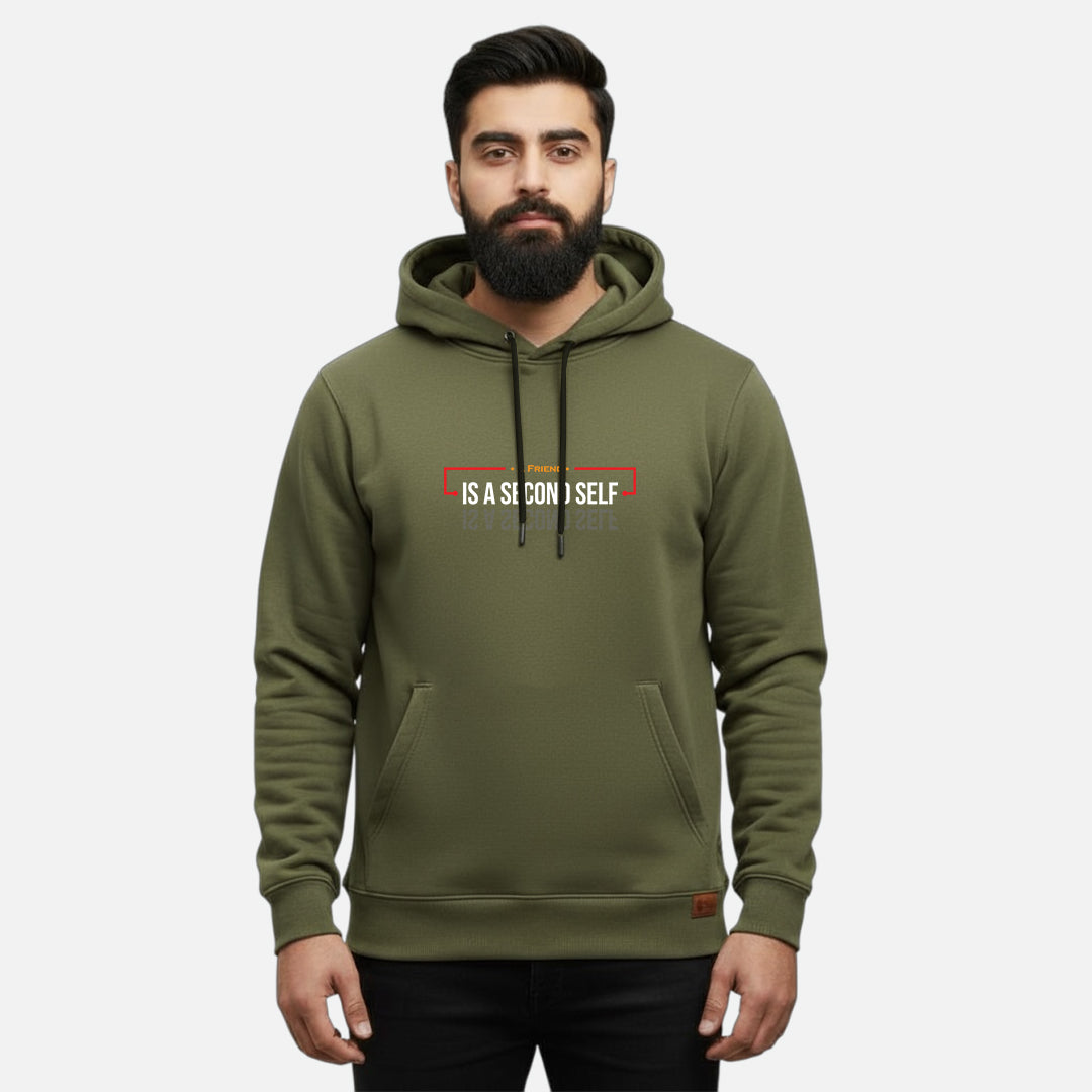 Sunnah Conscious olive green cotton kangaroo hoodie with A Friend is a Second Self graphic print on a bearded man.